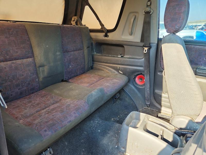 Photo 10 from auction – 1999 CHEVROLET TRACKER with VIN 2CNBJ18C3X6906067