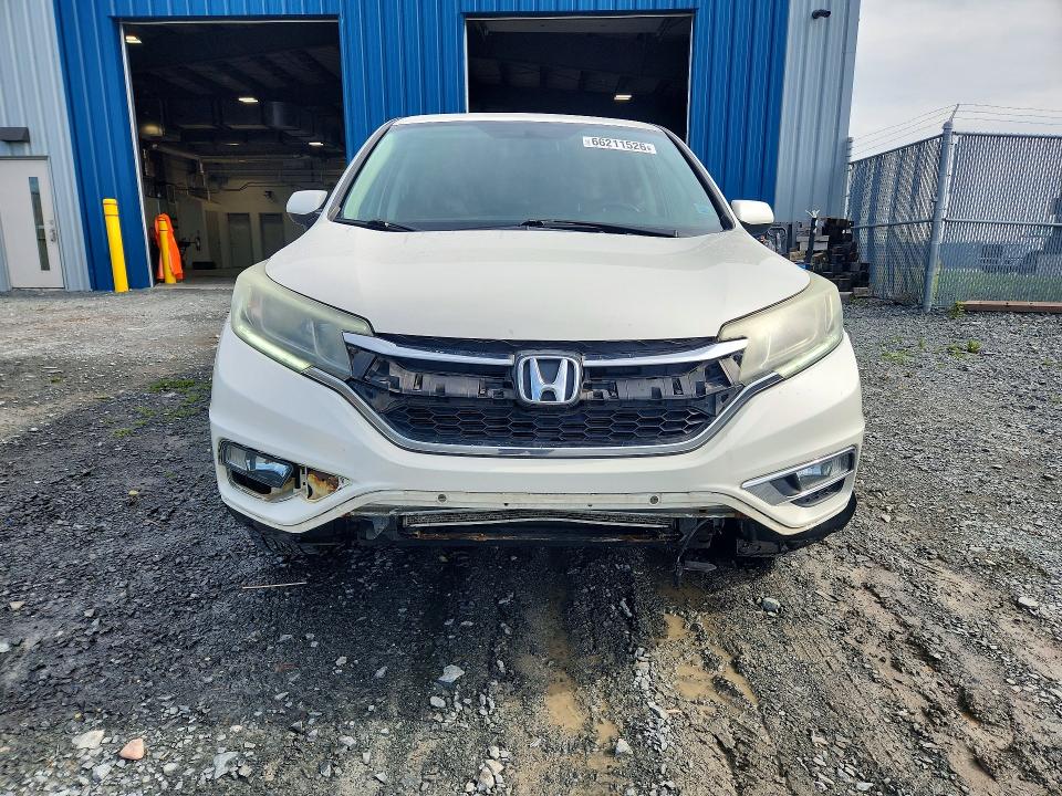 Photo 5 from auction – 2015 HONDA CR-V with VIN 2HKRM4H72FH118325