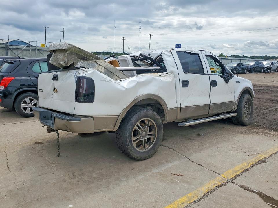 Photo 3 from auction – 2004 FORD F150 with VIN 1FTPW14504KC66525