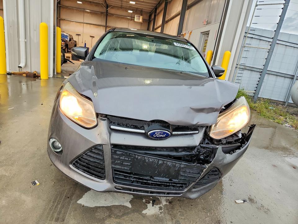 Photo 5 from auction – 2013 FORD FOCUS with VIN 1FADP3F20DL368843