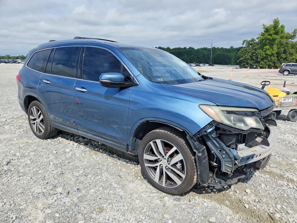 Photo 4 from auction – 2016 HONDA PILOT with VIN 5FNYF6H06GB105811