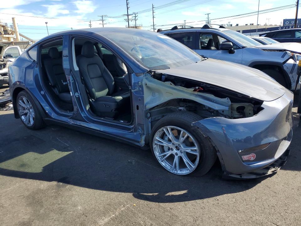 Photo 4 from auction – 2023 TESLA MODEL Y with VIN 7SAYGDEE1PF877928