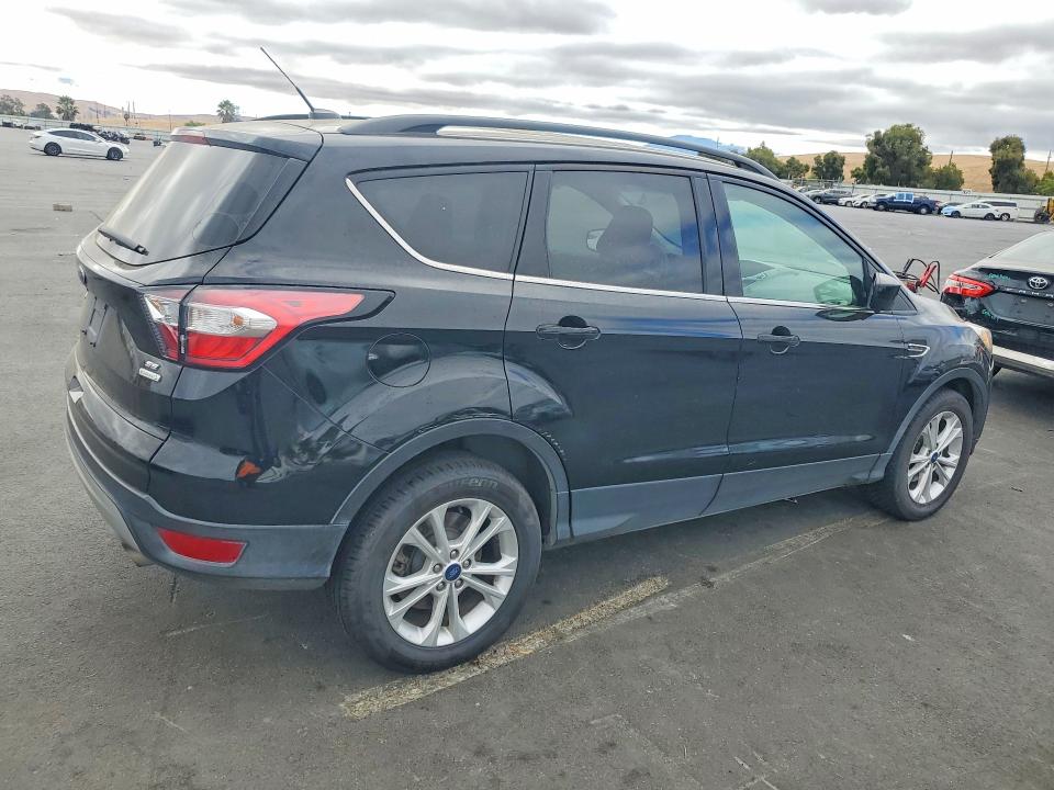 Фото 3 с аукциона – 2018 FORD ESCAPE с VIN 1FMCU0GD1JUB29073