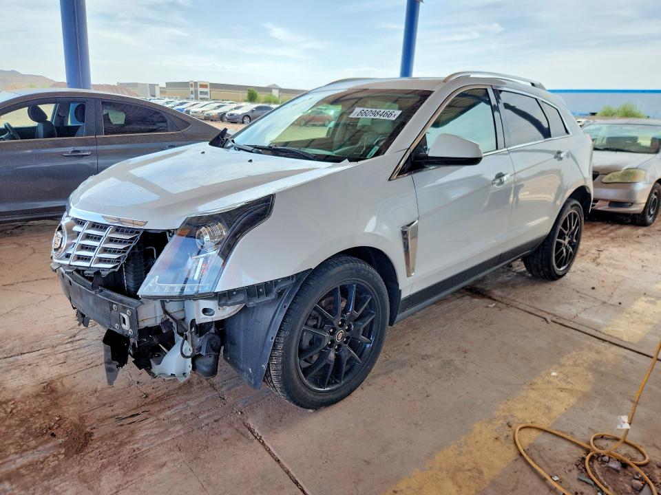 CADILLAC SRX 2015 with VIN 3GYFNBE33FS623716 - Photo from auction