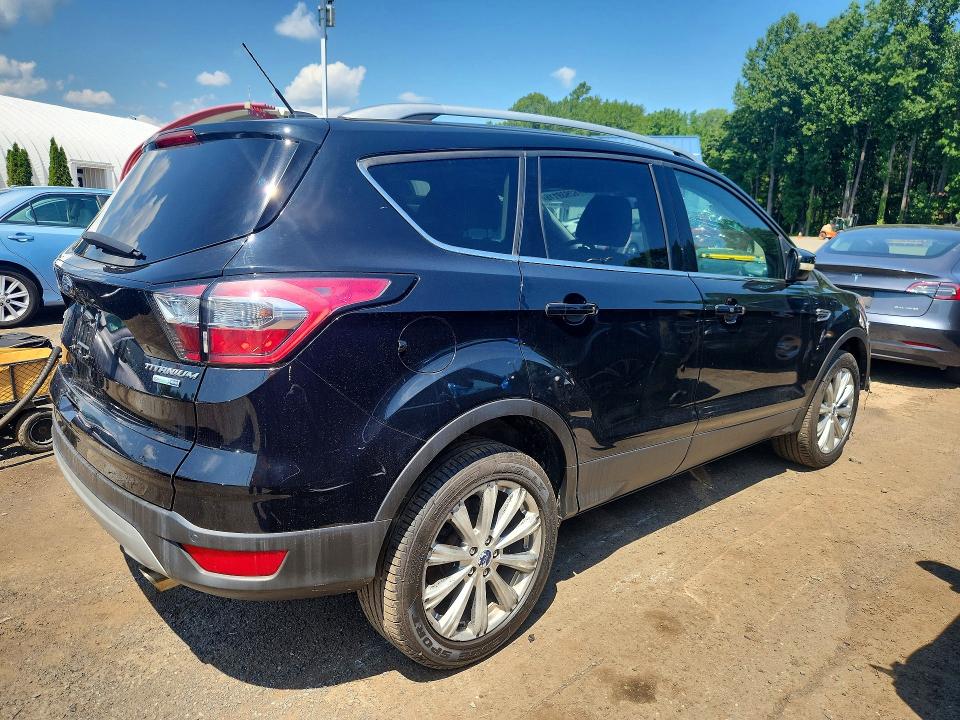 Photo 3 from auction – 2017 FORD ESCAPE with VIN 1FMCU9JD7HUE62613