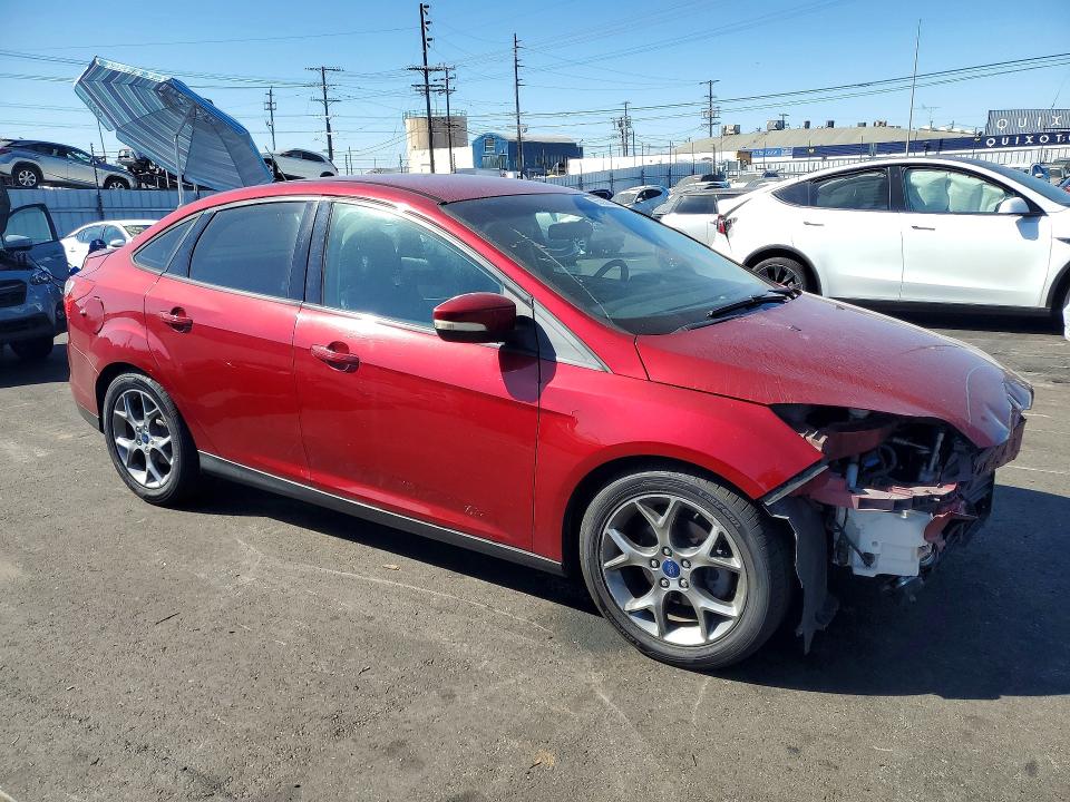 Photo 4 from auction – 2014 FORD FOCUS with VIN 1FADP3F29EL442472