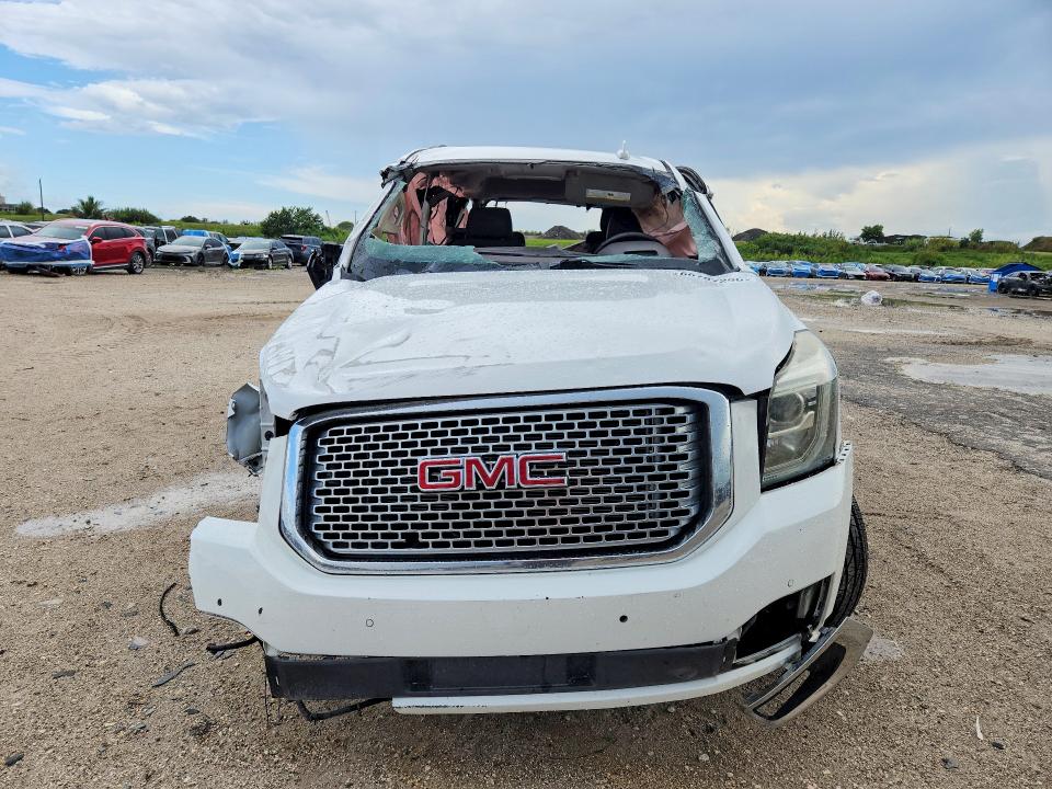 Photo 5 from auction – 2016 GMC YUKON with VIN 1GKS1CKJXGR208264