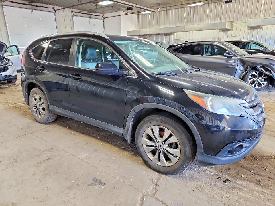 Photo 4 from auction – 2014 HONDA CR-V with VIN 2HKRM4H77EH684544