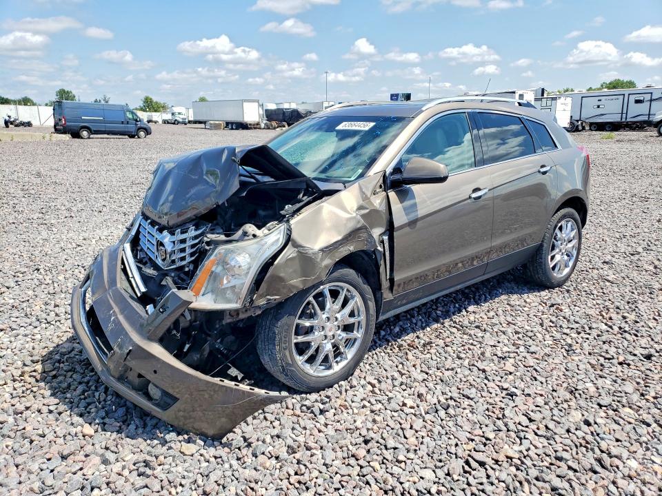 CADILLAC SRX 2014 with VIN 3GYFNFE34ES579859 - Photo from auction