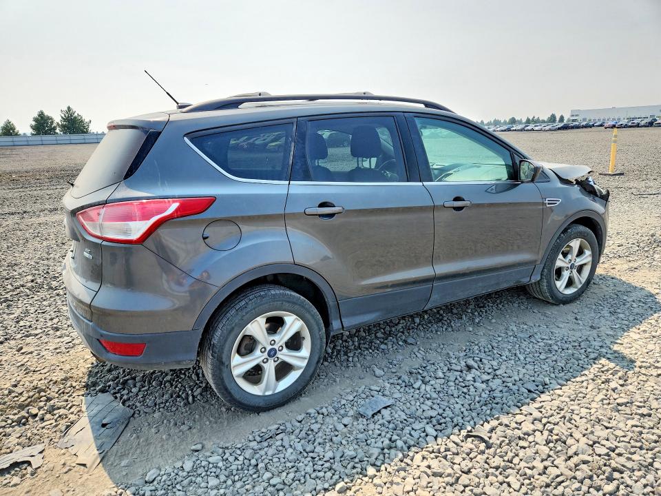 Photo 3 from auction – 2016 FORD ESCAPE with VIN 1FMCU9GX6GUC33064