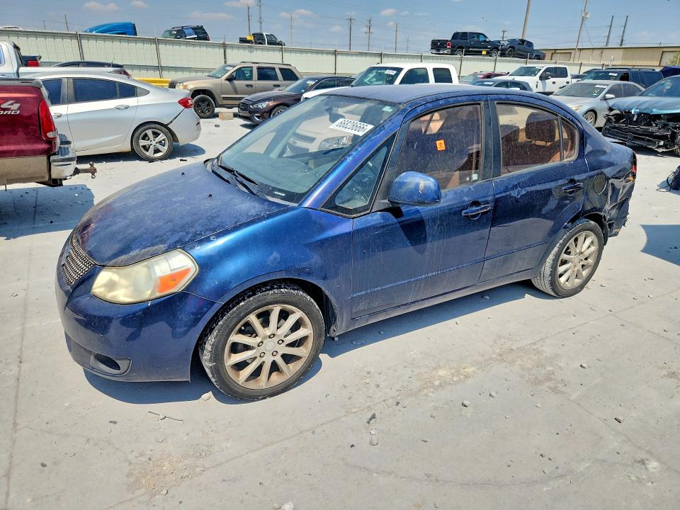 SUZUKI SX4 2011 con VIN JS2YC5A21B6301003 - Foto de la subasta