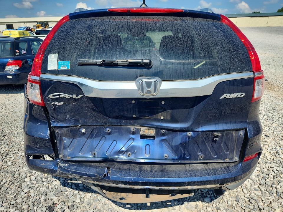 Photo 6 from auction – 2015 HONDA CR-V with VIN 2HKRM4H73FH655995