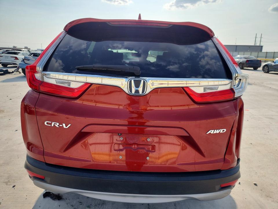 Photo 6 from auction – 2017 HONDA CR-V with VIN 2HKRW2H57HH674100