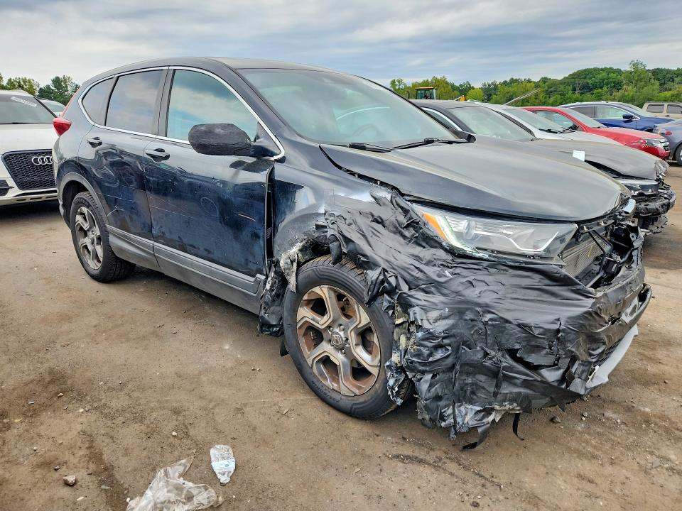 Photo 4 from auction – 2018 HONDA CR-V with VIN 7FARW2H84JE000120