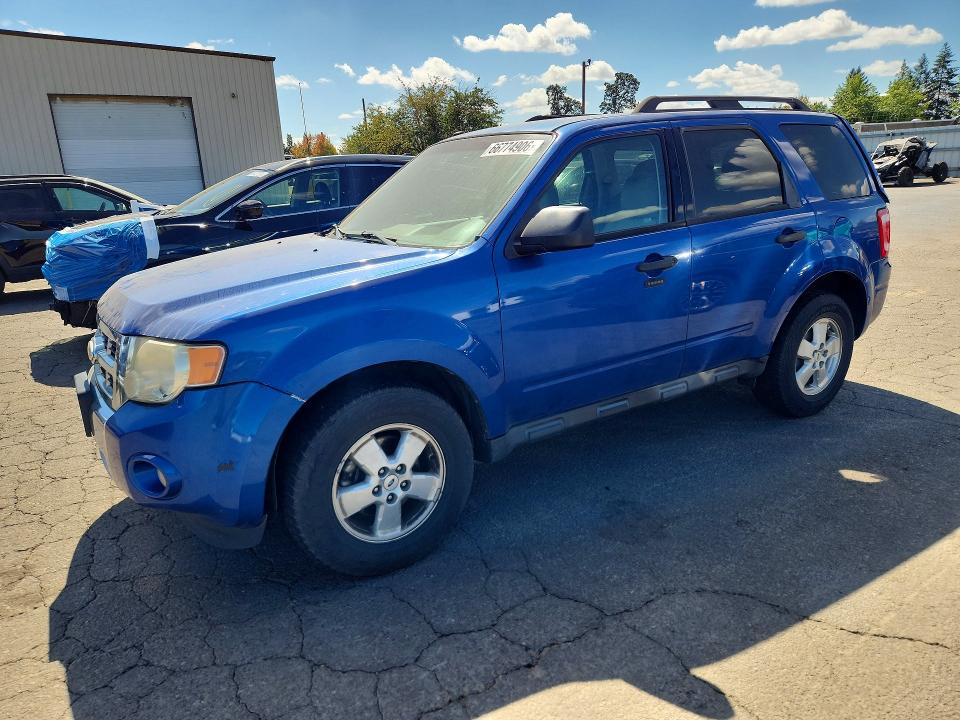 FORD ESCAPE 2011 with VIN 1FMCU0D75BKB20694 - Photo from auction