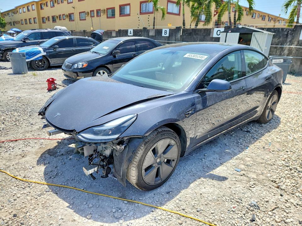 TESLA MODEL 3 2023 with VIN 5YJ3E1EA3PF694460 - Photo from auction