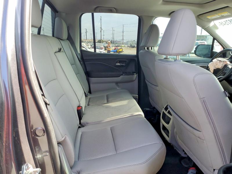 Photo 10 from auction – 2023 HONDA RIDGELINE with VIN 5FPYK3F54PB039730