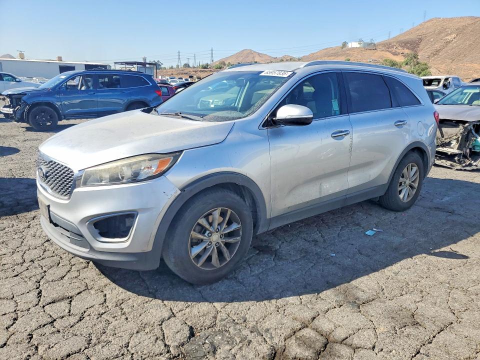 KIA SORENTO 2016 with VIN 5XYPG4A34GG017169 - Photo from auction
