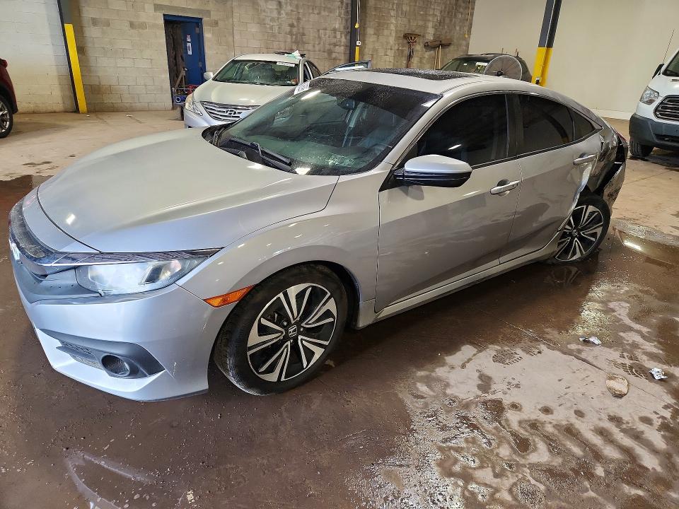 HONDA CIVIC 2016 with VIN 2HGFC1F70GH638705 - Photo from auction