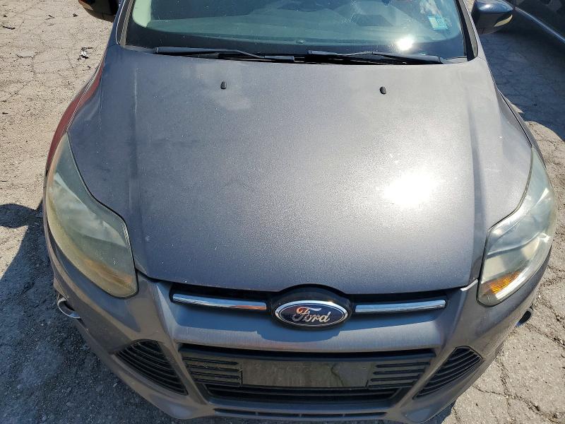 Photo 11 from auction – 2014 FORD FOCUS with VIN 1FADP3F20EL129231