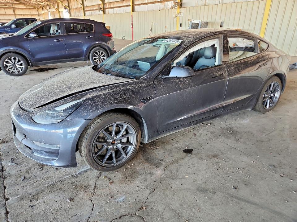 TESLA MODEL 3 2022 with VIN 5YJ3E1EB2NF130742 - Photo from auction