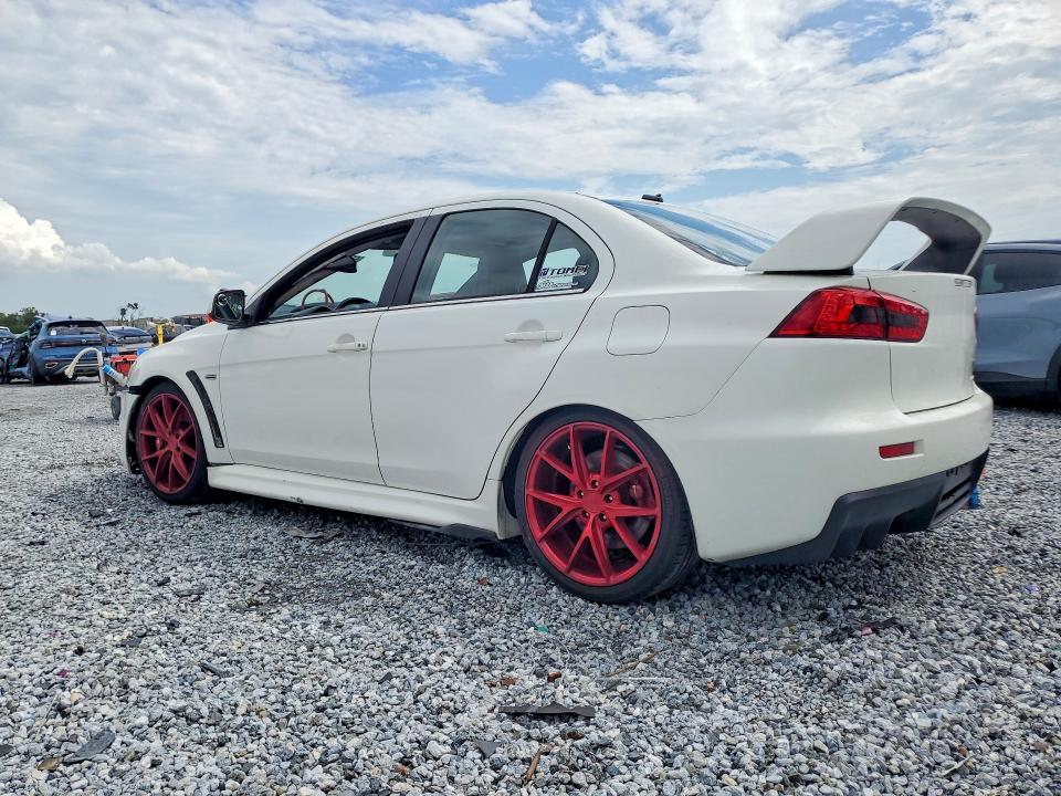 Photo 2 from auction – 2013 MITSUBISHI LANCER with VIN JA32W5FV2DU011733