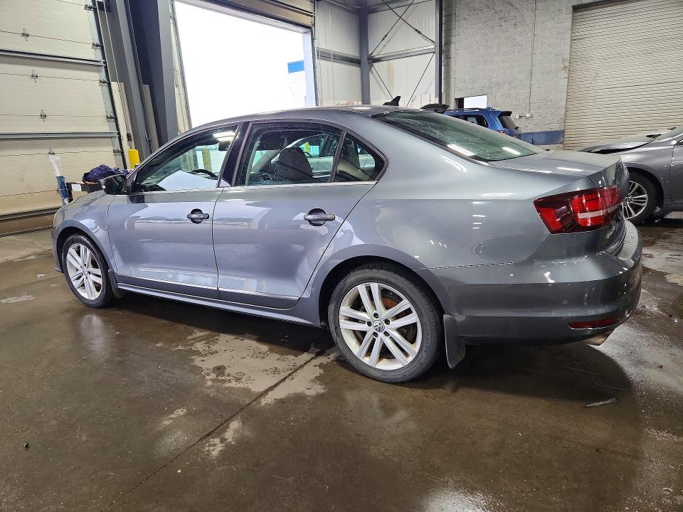 Снимка 2 от търг – 2017 VOLKSWAGEN JETTA с VIN 3VWL17AJ1HM399548