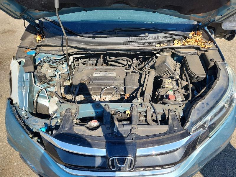 Photo 12 from auction – 2015 HONDA CR-V with VIN 2HKRM4H53FH672214