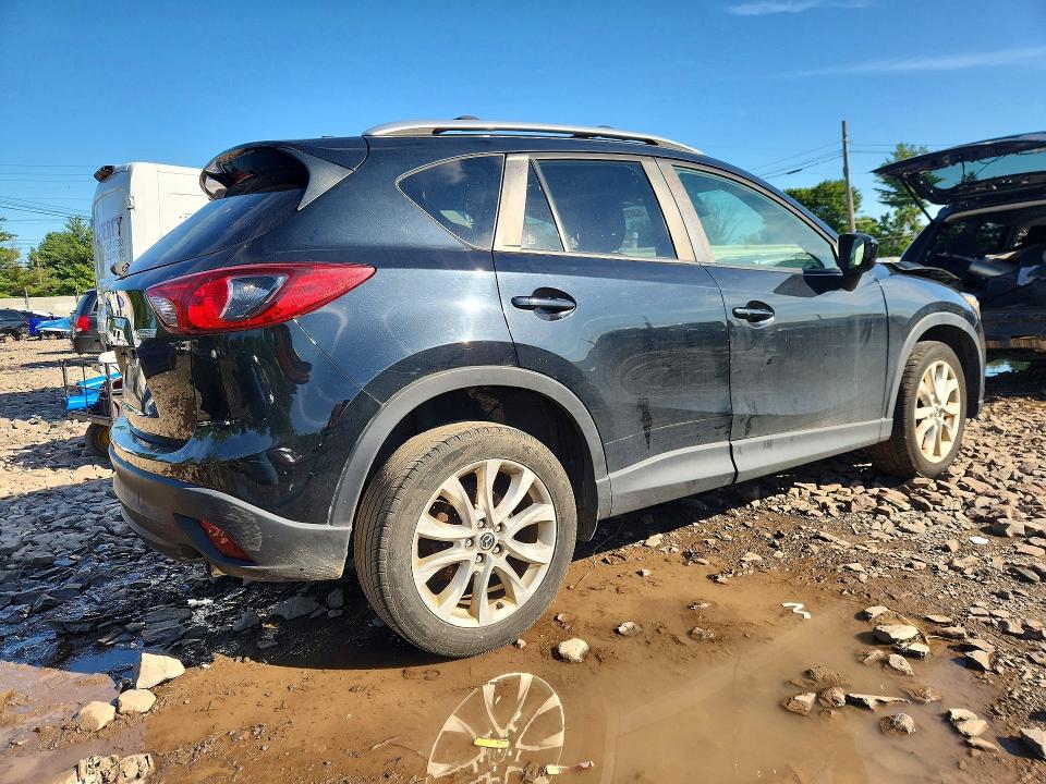Photo 3 from auction – 2014 MAZDA CX-5 with VIN JM3KE4DY8E0416152