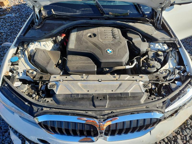 Photo 11 from auction – 2022 BMW 330XI with VIN 3MW5R7J06N8C51618