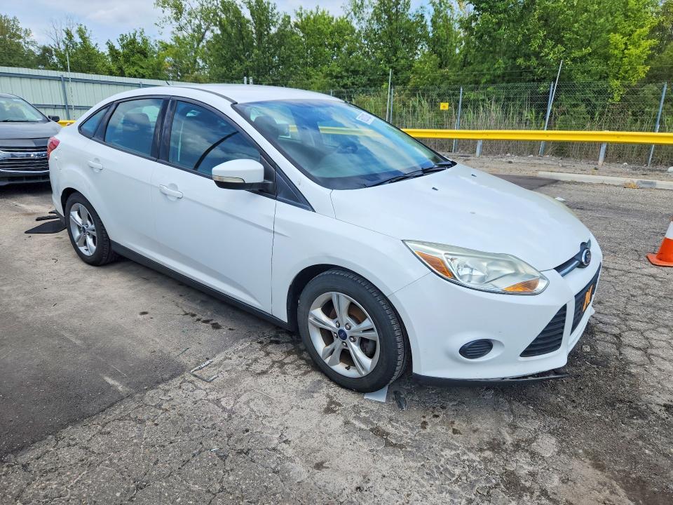 Photo 4 from auction – 2014 FORD FOCUS with VIN 1FADP3F27EL126987