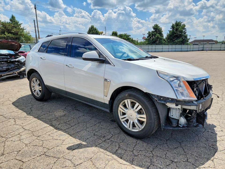Photo 4 from auction – 2016 CADILLAC SRX with VIN 3GYFNBE36GS550312