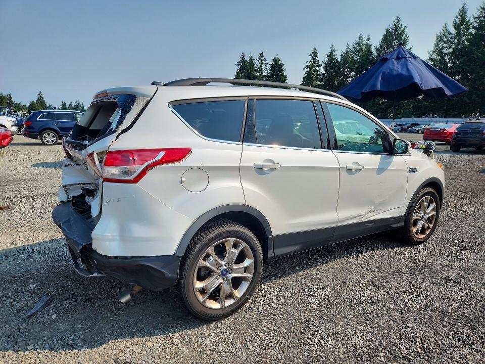 Photo 3 from auction – 2016 FORD ESCAPE with VIN 1FMCU9GX7GUA68772