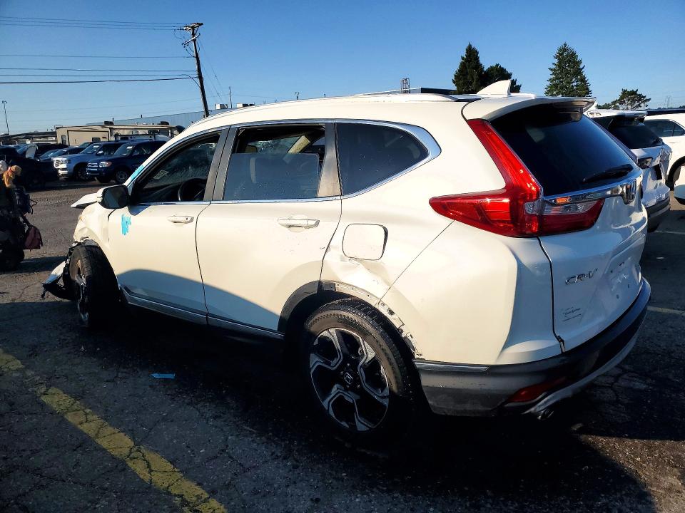 Photo 2 from auction – 2017 HONDA CR-V with VIN 2HKRW2H95HH614688
