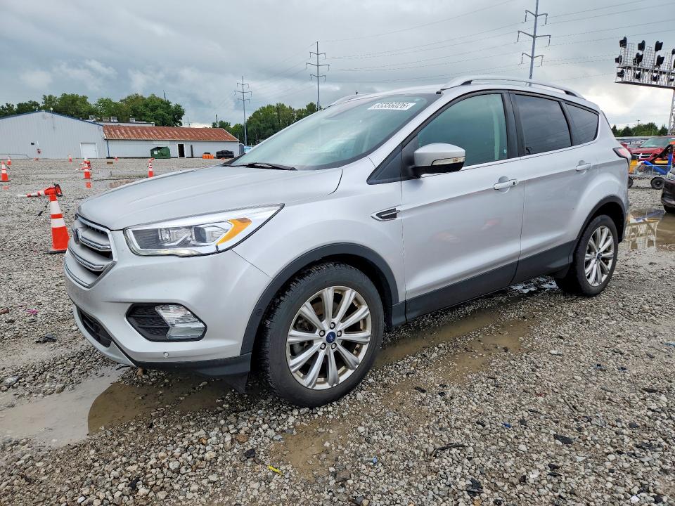 FORD ESCAPE 2018 with VIN 1FMCU0J99JUC03442 - Photo from auction