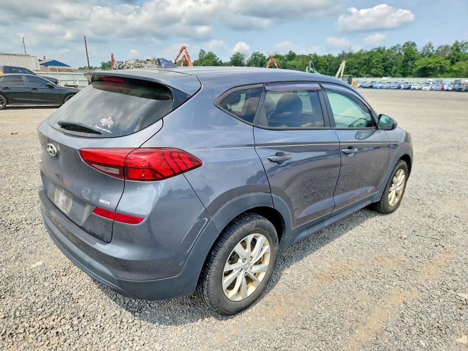 Photo 3 from auction – 2019 HYUNDAI TUCSON with VIN KM8J2CA48KU039587