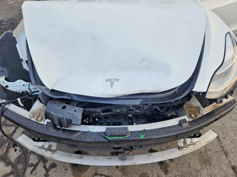 Photo 11 from auction – 2022 TESLA MODEL 3 with VIN 5YJ3E1EA8NF113273