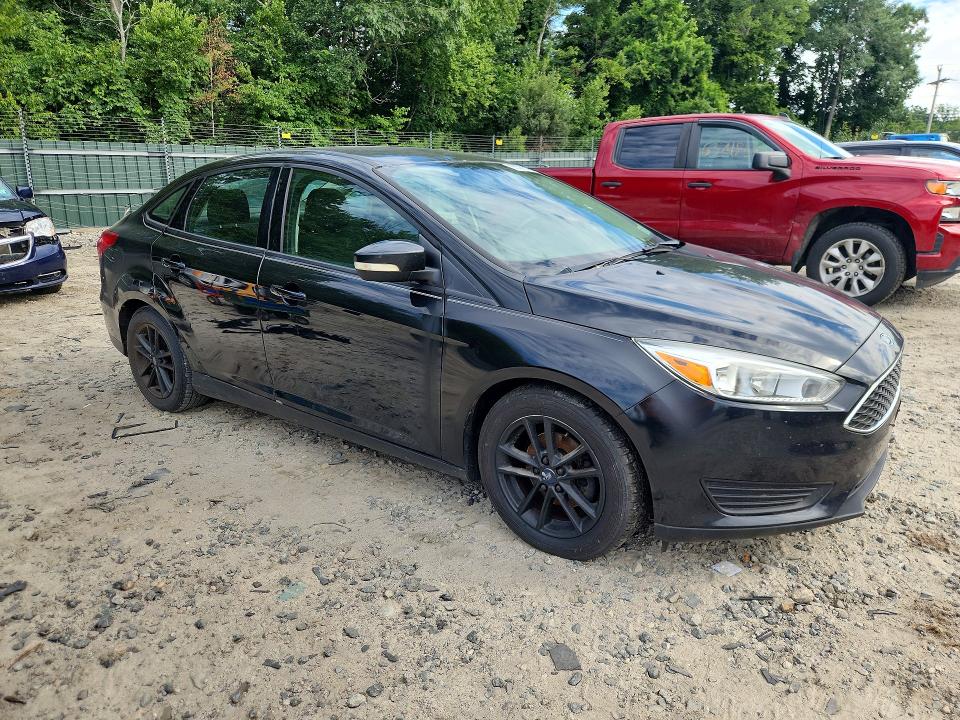 Photo 4 from auction – 2015 FORD FOCUS with VIN 1FADP3F25FL365083