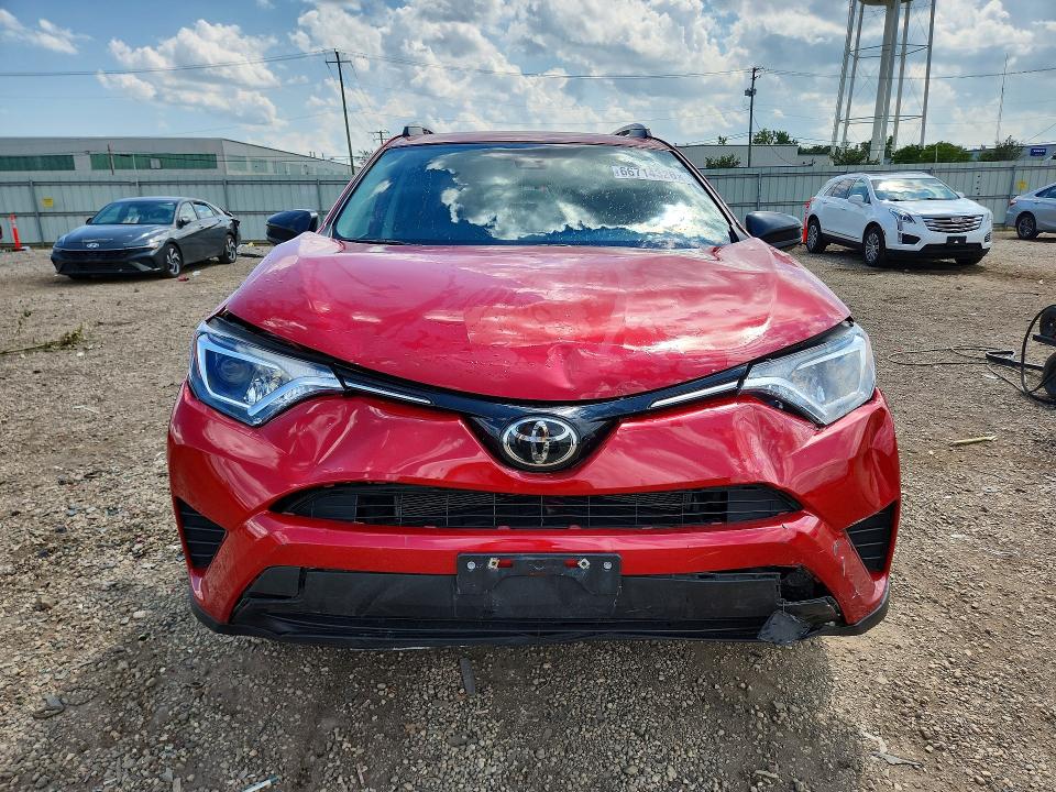 Photo 5 from auction – 2017 TOYOTA RAV4 with VIN 2T3ZFREV6HW379401