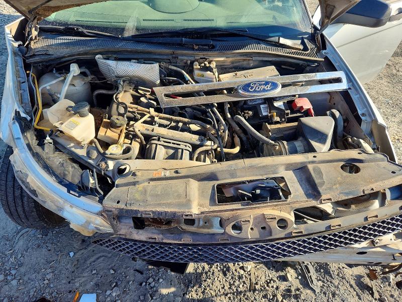 Photo 11 from auction – 2011 FORD FOCUS with VIN 1FAHP3FN3BW179465