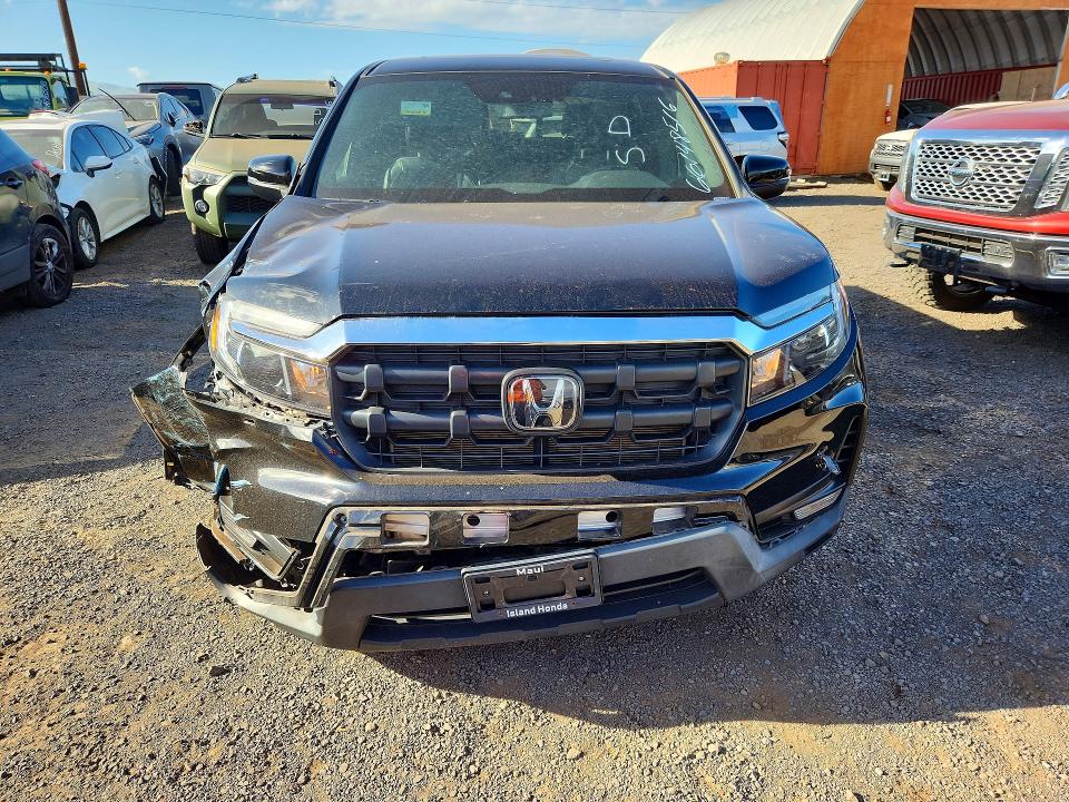 Photo 5 from auction – 2024 HONDA RIDGELINE with VIN 5FPYK3F58RB007639