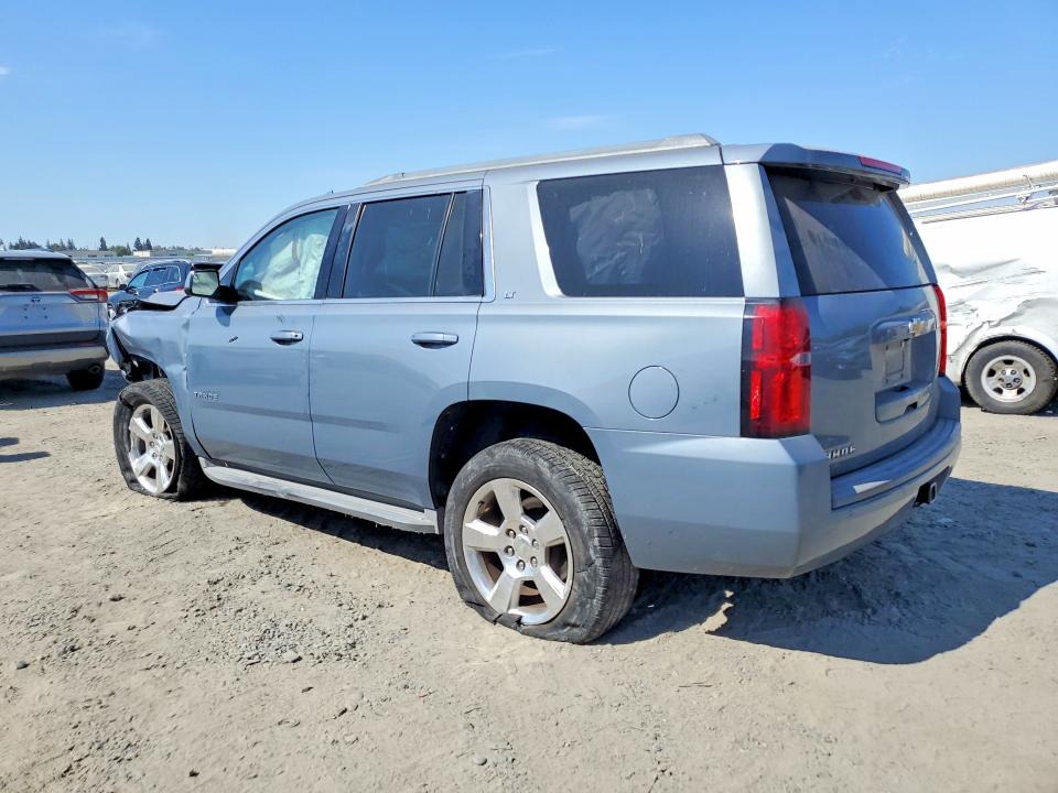 Photo 2 from auction – 2015 CHEVROLET TAHOE with VIN 1GNSCBKC7FR672250