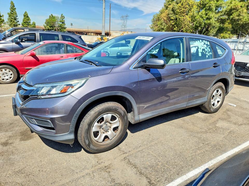Photo 1 from auction – 2015 HONDA CR-V with VIN 2HKRM3H35FH504700