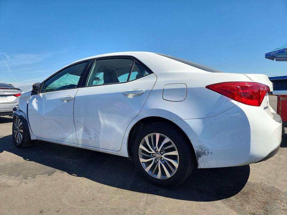 Photo 2 from auction – 2018 TOYOTA COROLLA with VIN 5YFBURHE1JP797206