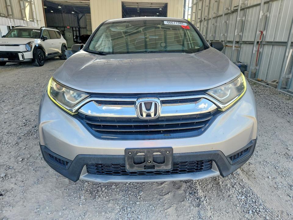 Photo 5 from auction – 2017 HONDA CR-V with VIN 5J6RW5H33HL000788