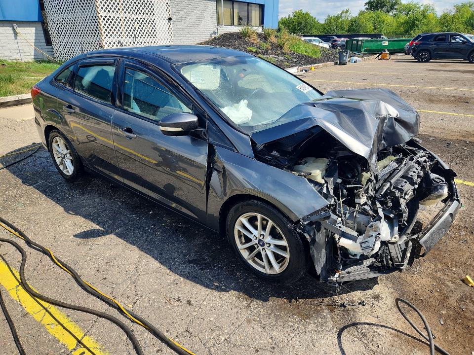 Photo 4 from auction – 2016 FORD FOCUS with VIN 1FADP3F24GL359437