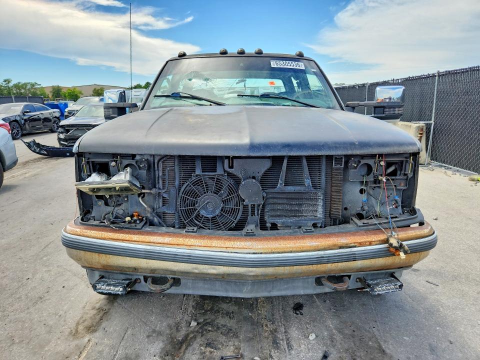 Foto 5 de la subasta – 2000 GMC SIERRA con VIN 1GTHK33J1YF453961