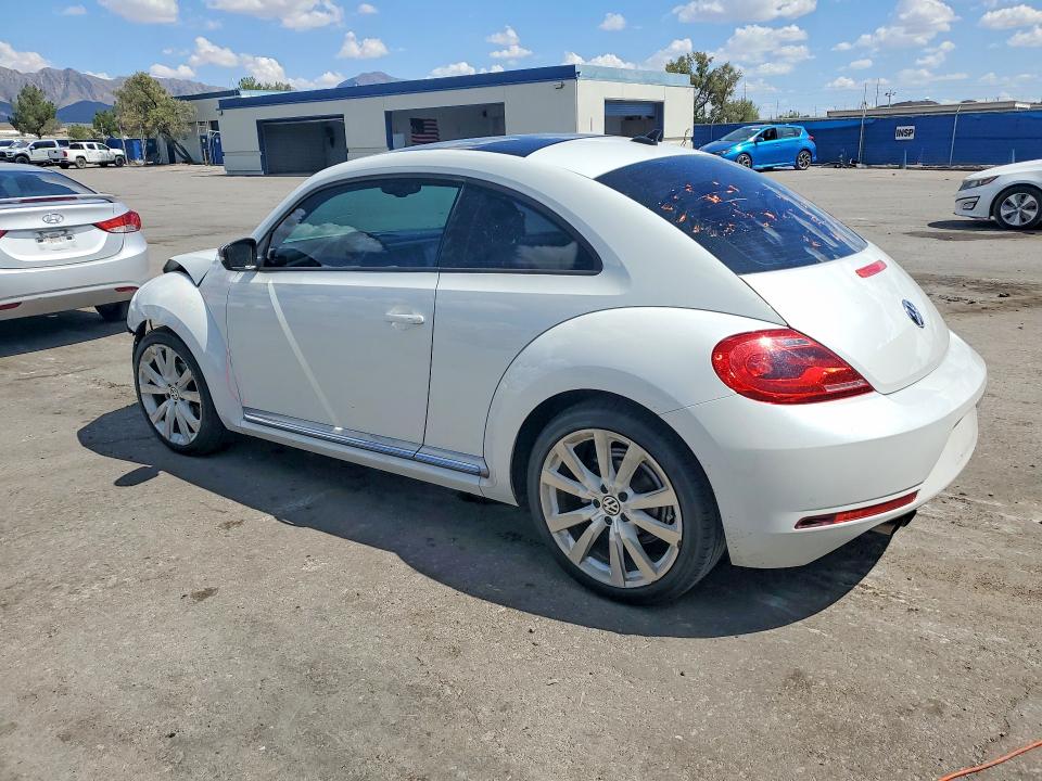 Снимка 2 от търг – 2014 VOLKSWAGEN BEETLE с VIN 3VWJ17AT6EM653887