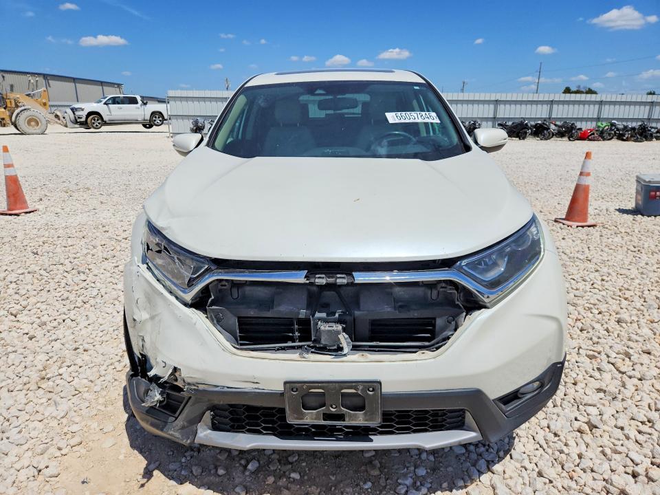 Photo 5 from auction – 2018 HONDA CR-V with VIN 2HKRW2H84JH624593