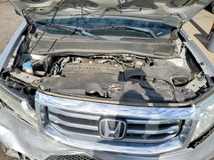 Photo 11 from auction – 2013 HONDA PILOT with VIN 5FNYF4H23DB008132